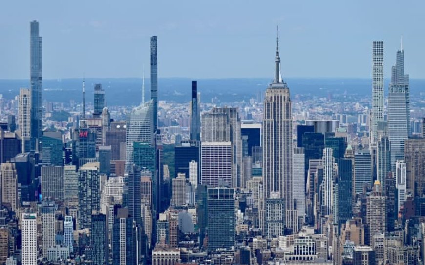 Already threatened by rising waters, New York is sagging under the weight of its skyscrapers