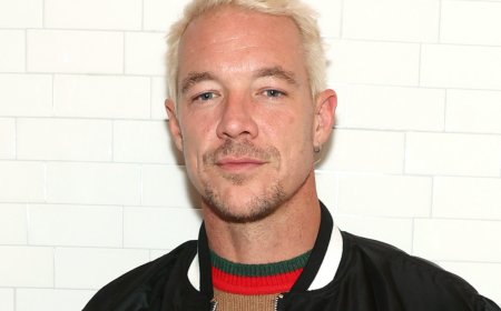 Diplo shows off his ripped abs in Italy & now we’re so “not not gay” for him