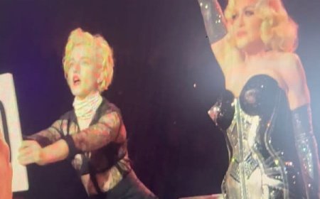 Julia Garner joins Madonna on stage