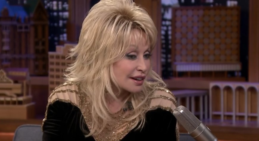 Dolly Parton Gifts Guitar To Texas Drag Queen/Activist
