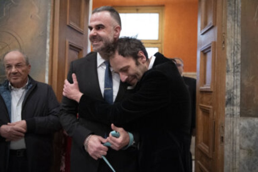 A Greek novelist and a lawyer are the first same-sex couple to wed at Athens city hall