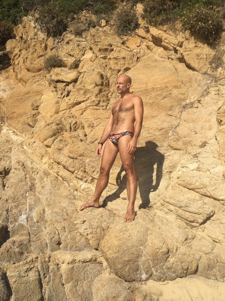 This sexy Greek daddy can teach you everything you need to know about Athens