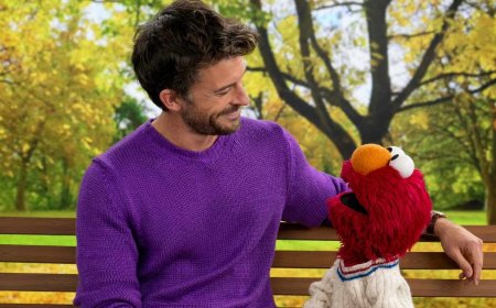Jonathan Bailey Shares a Tender Moment with Elmo on ‘Sesame Street’