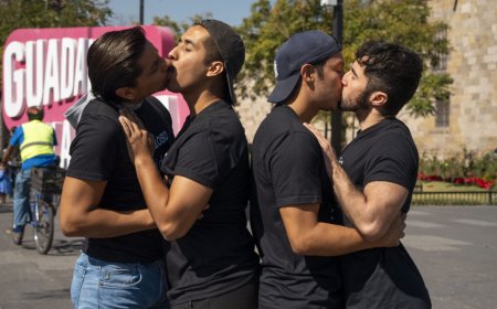 A Border Kiss-In on World AIDS Day Eve Is Rewriting the Story of HIV Visibility