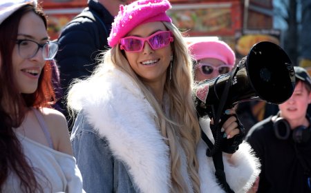 Marchers gather for The Doll Walk to mark Transgender Day of Visibility