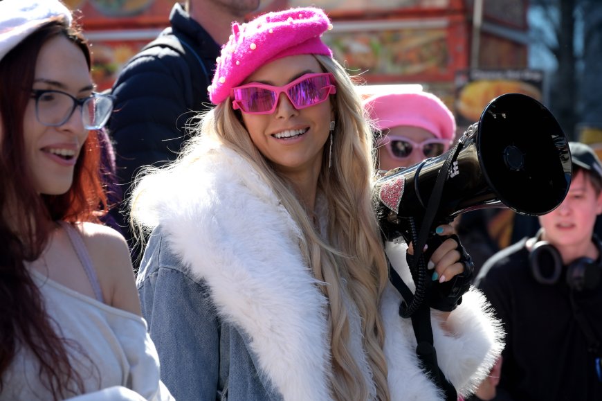 Marchers gather for The Doll Walk to mark Transgender Day of Visibility