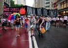 NYC Dyke March pushes through the rain on Pride Saturday