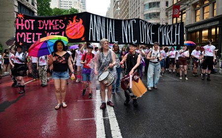 NYC Dyke March pushes through the rain on Pride Saturday